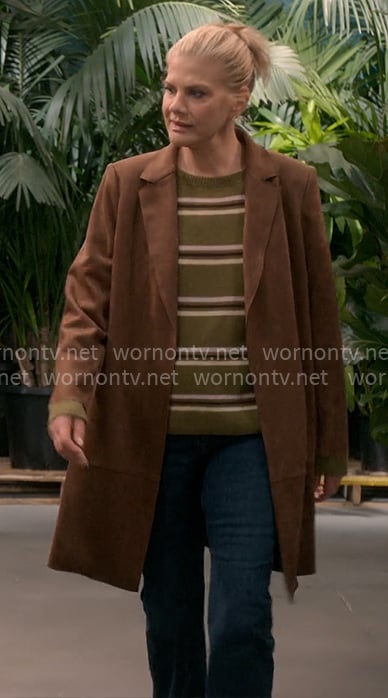 Carol’s green striped sweater and suede jacket on Leanne