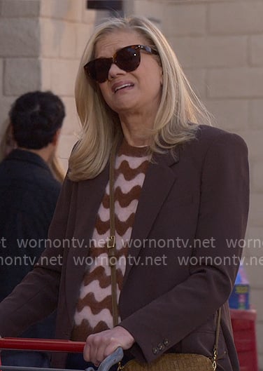 Carol’s pink wavy stripe sweater with brown blazer on Leanne