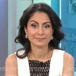 Celine Gounder’s cream dress with black fishnet inset on CBS Mornings Celine Gounder’s cream dress with black fishnet inset on CBS Mornings