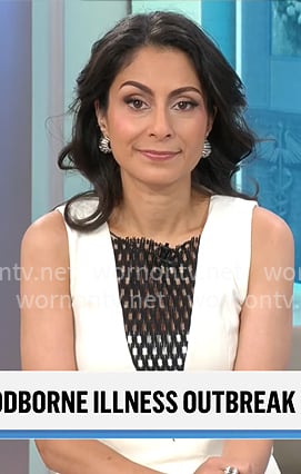 Celine Gounder’s cream dress with black fishnet inset on CBS Mornings Celine Gounder’s cream dress with black fishnet inset on CBS Mornings