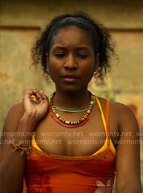 Cleo's orange floral tank top on Outer Banks