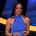 Corinne’s blue sleeveless mock neck top on Beat Shazam
