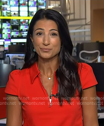 Daniele Hamamdjian’s red zip polo top on Today