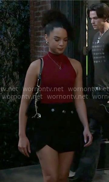 Deanna’s red mock-neck top on Beyond the Gates Deanna’s red mock-neck top on Beyond the Gates
