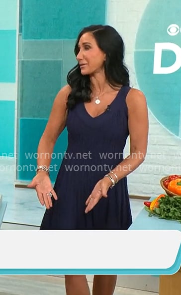 Elizabeth Werner’s navy v-neck textured dress on CBS Mornings Elizabeth Werner’s navy v-neck textured dress on CBS Mornings