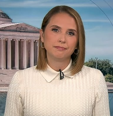 Elizabeth's white collared knit sweater on Good Morning America