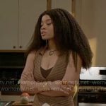 Eva’s brown ribbed split front knit top with white skirt on Beyond the Gates