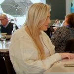 Gina’s white cable knit sweater on The Real Housewives of Orange County Gina’s white cable knit sweater on The Real Housewives of Orange County