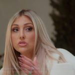 Gina’s white ribbed oversized blazer on The Real Housewives of Orange County Gina’s white ribbed oversized blazer on The Real Housewives of Orange County