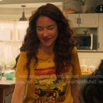 Hannah’s yellow graphic print tee on My Life with the Walter Boys Hannah’s yellow graphic print tee on My Life with the Walter Boys