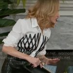 Heather’s white shirt with black lattice front and croc skirt on Beyond the Gates Heather’s white shirt with black lattice front and croc skirt on Beyond the Gates