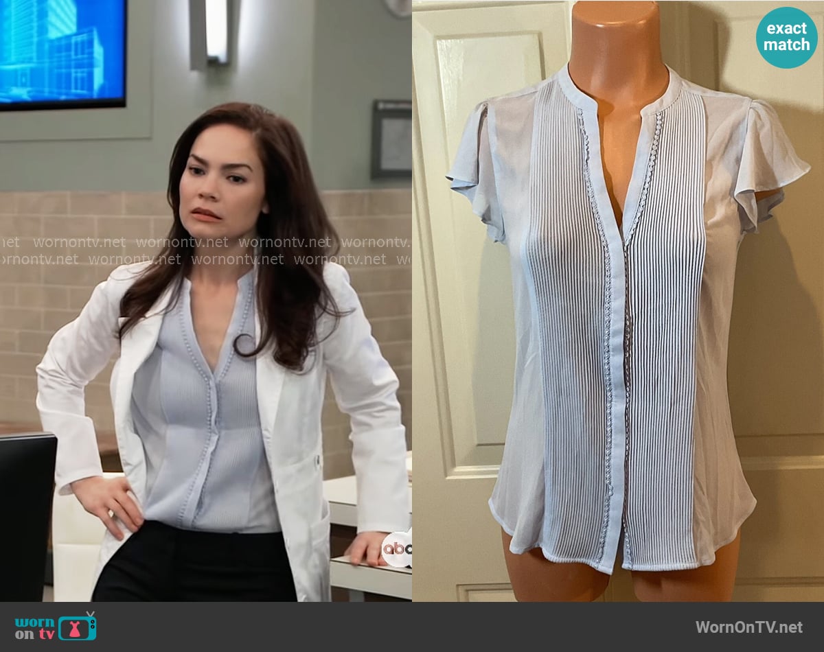H&M Pleated Front Blouse worn by Elizabeth Webber (Rebecca Herbst) on General Hospital H&M Pleated Front Blouse worn by Elizabeth Webber (Rebecca Herbst) on General Hospital