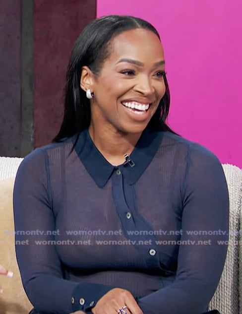 Khadijah Haqq’s blue asymmetric button top on Access Hollywood