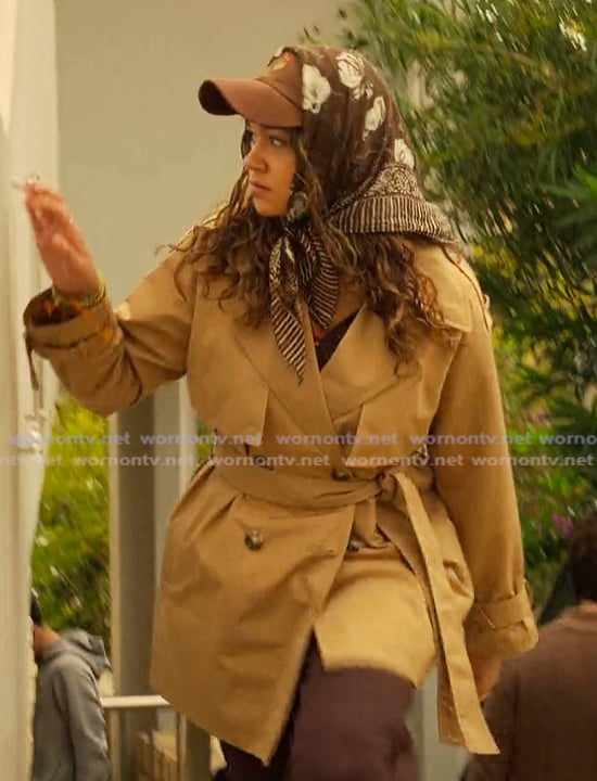 Kiara's beige trench coat on Outer Banks