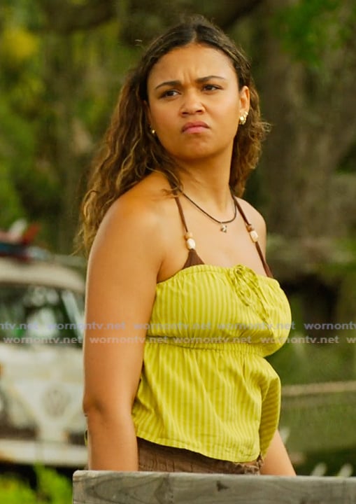 Kiara's green pinstripe strapless top on Outer Banks