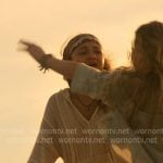 Kiara's white striped hoodie on Outer Banks
