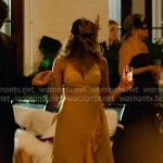 Kiara's yellow ruffle wrap dress on Outer Banks