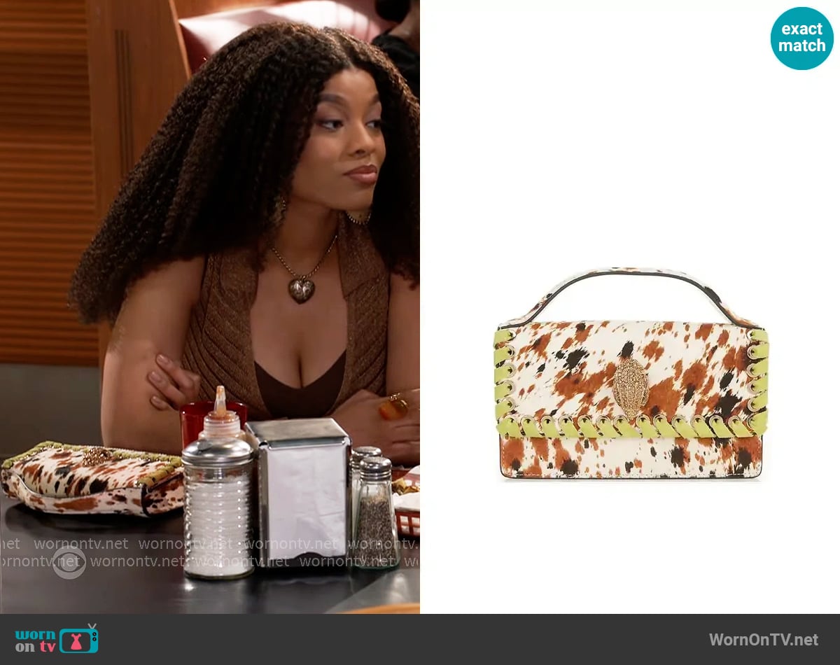 Kurt Geiger Small Bond Top Handle Cow Print Haircalf Satchel Bag worn by Eva Thomas (Ambyr Michelle) on Beyond the Gates