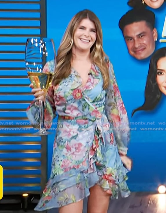 Lauren Herbert’s blue floral print ruffle dress on Access Hollywood