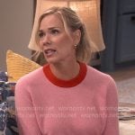 Leanne’s pink sweater with red trims on Leanne