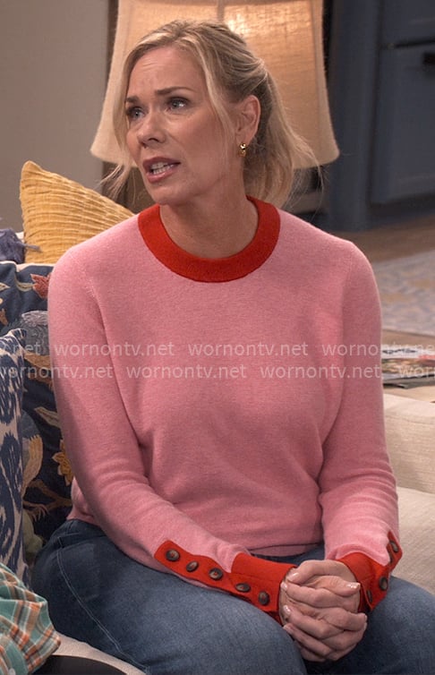 Leanne's pink sweater with red trims on Leanne