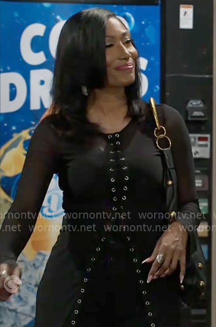 Leslie’s sheer black lace-up cardigan on Beyond the Gates Leslie’s sheer black lace-up cardigan on Beyond the Gates
