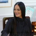 Lisa’s black drape neck top on The Real Housewives Ultimate Girls Trip