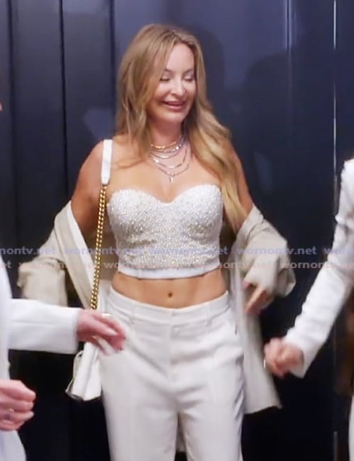 Lital’s white beaded cropped top on The Real Housewives Ultimate Girls Trip Lital’s white beaded cropped top on The Real Housewives Ultimate Girls Trip