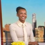 Malika Andrews's ivory tie neck top on Good Morning America Malika Andrews's ivory tie neck top on Good Morning America