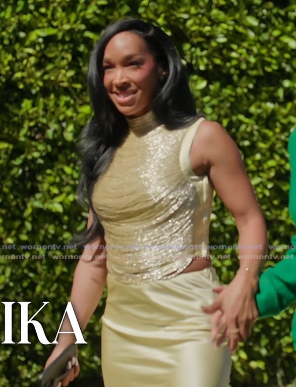 Malika’s yellow metallic top and skirt on The Girls A Khloe Kardashian Project