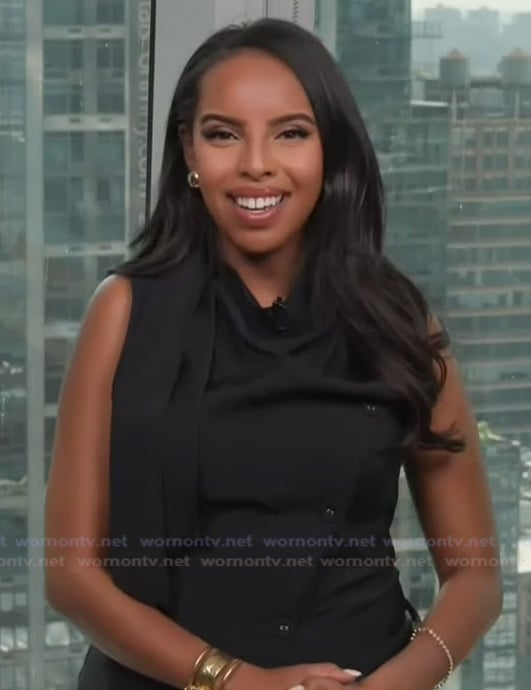 Mona’s black drape top on Extra