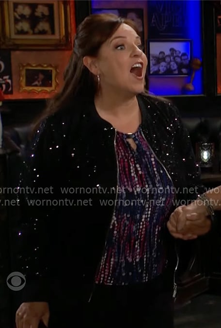 Nina's printed keyhole top and black sequin bomber jacket on The Young and the Restless