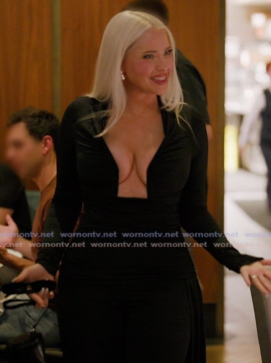 Olivia's black plunging jumpsuit on The Girls A Khloe Kardashian Project