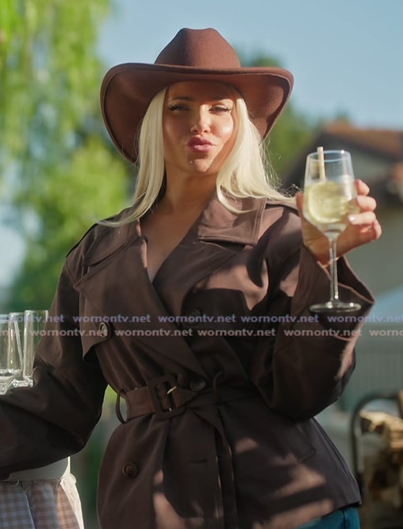 Olivia’s brown trench jacket on The Girls A Khloe Kardashian Project