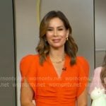 Rebecca Jarvis’s orange ruched front dress on Good Morning America Rebecca Jarvis’s orange ruched front dress on Good Morning America