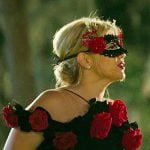 Rose Cameron'sc black ruffle off shoulder dress on Outer Banks