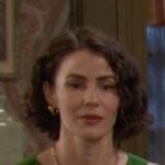 Srah’s green buttoned asymmetric top on Days of our Lives Srah’s green buttoned asymmetric top on Days of our Lives