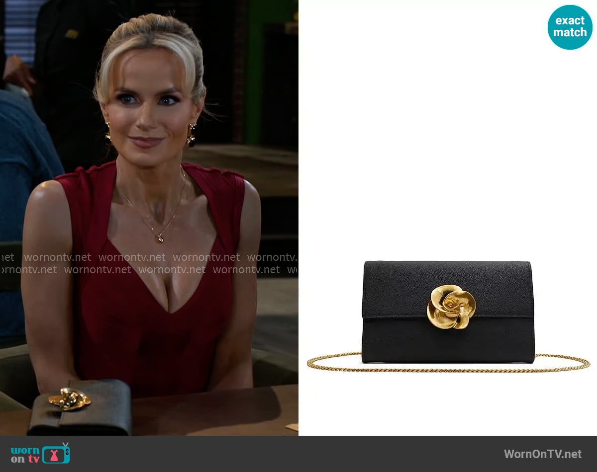 Ted Baker Kira Rose Clutch worn by Vanessa McBride (Lauren Buglioli) on Beyond the Gates Ted Baker Kira Rose Clutch worn by Vanessa McBride (Lauren Buglioli) on Beyond the Gates