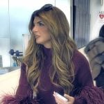 Teresa’s burgundy feather cuff sweater on The Real Housewives Ultimate Girls Trip Teresa’s burgundy feather cuff sweater on The Real Housewives Ultimate Girls Trip