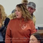 Tessa’s orange half-zip sweatshirt on The McBee Dynasty Real American Cowboys Tessa’s orange half-zip sweatshirt on The McBee Dynasty Real American Cowboys