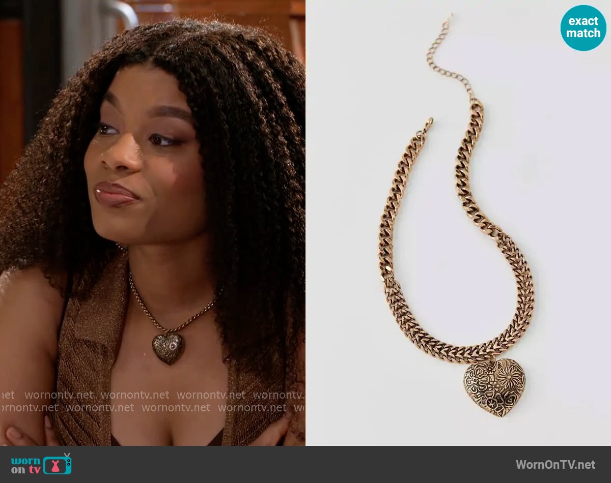 Urban Outfitters Etched Heart Choker Necklace worn by Eva Thomas (Ambyr Michelle) on Beyond the Gates