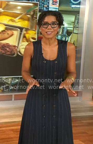 Adriana Diaz’s navy pinstripe midi dress on CBS Mornings Adriana Diaz’s navy pinstripe midi dress on CBS Mornings
