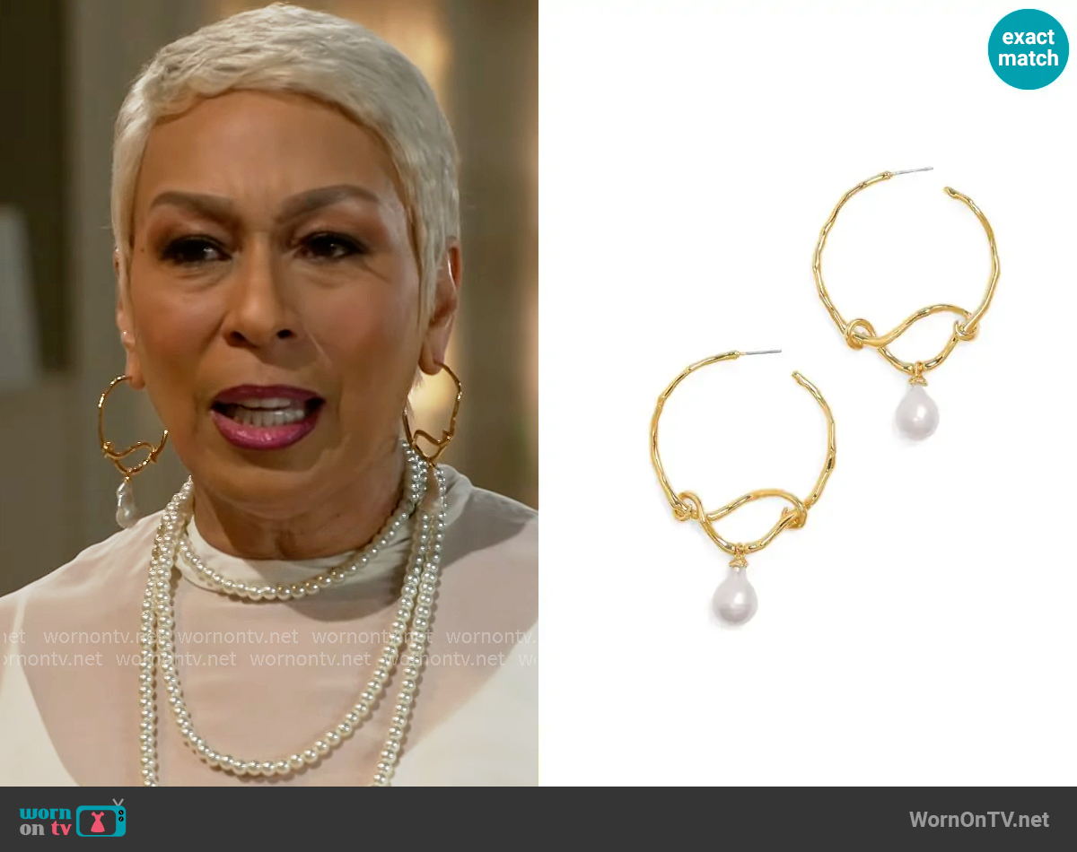 Anita's Alexis Bittar earrings