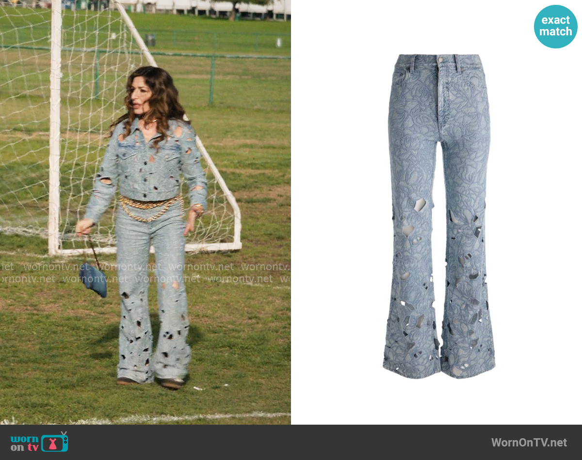 Alice + Olivia Chic Eyelet Jean in Rockstar Blue worn by Esmeralda Grand (Sabrina Impacciatore) on The Paper Alice + Olivia Chic Eyelet Jean in Rockstar Blue worn by Esmeralda Grand (Sabrina Impacciatore) on The Paper