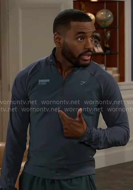 Andre's steel blue quarter zip top on Beyond the Gates