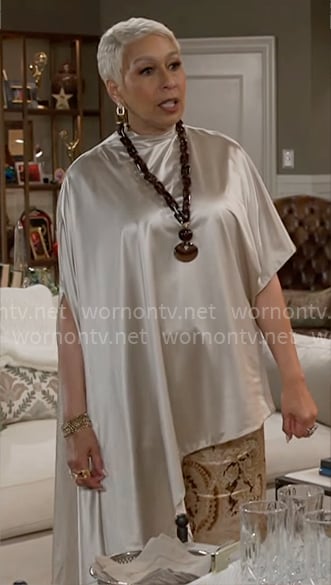Anita’s satin asymmetric top and paisley trousers on Beyond the Gates Anita’s satin asymmetric top and paisley trousers on Beyond the Gates