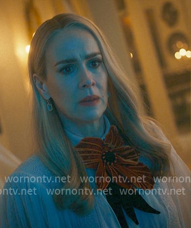 Cordelia’s pink floral blouse with flower on American Horror Story Cordelia’s pink floral blouse with flower on American Horror Story