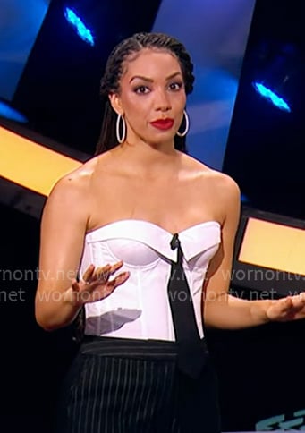 Corinne’s white strapless top with black tie on Beat Shazam Corinne’s white strapless top with black tie on Beat Shazam