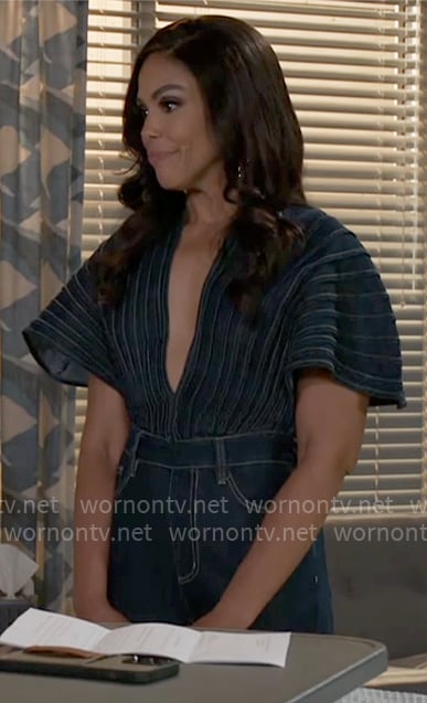 Dani’s denim deep v-neck jumpsuit on Beyond the Gates