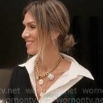Erin’s navy side button knit vest on The Real Housewives of New York City Erin’s navy side button knit vest on The Real Housewives of New York City